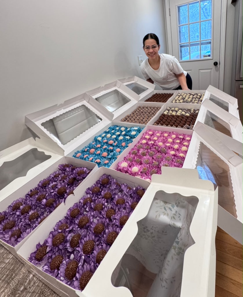 Stefhany with a tray of handmade brigadeiros